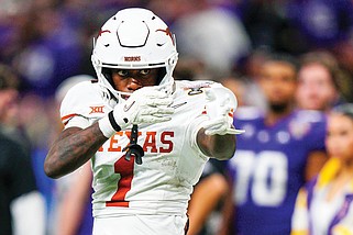 In this Jan. 1 file photo, Texas wide receiver Xavier Worthy celebrates during the College Football Playoff semifinal game against Washington in New Orleans. Worthy was the first-round selection by the Chiefs. (Associated Press)